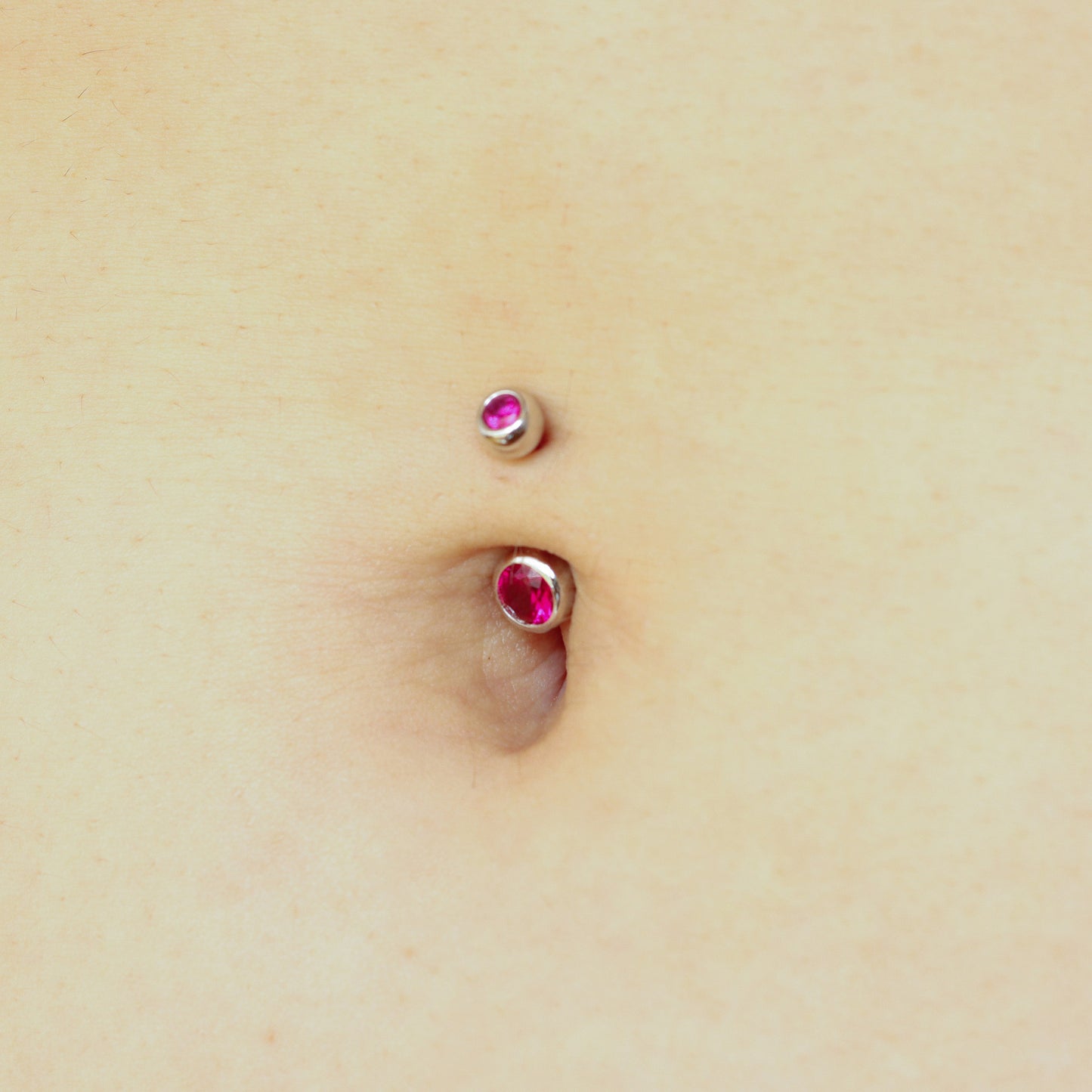 pink navel piercing