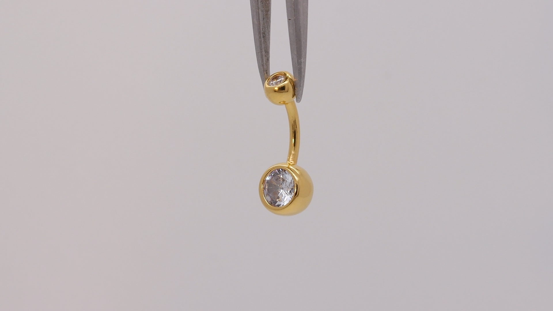 gold belly button ring