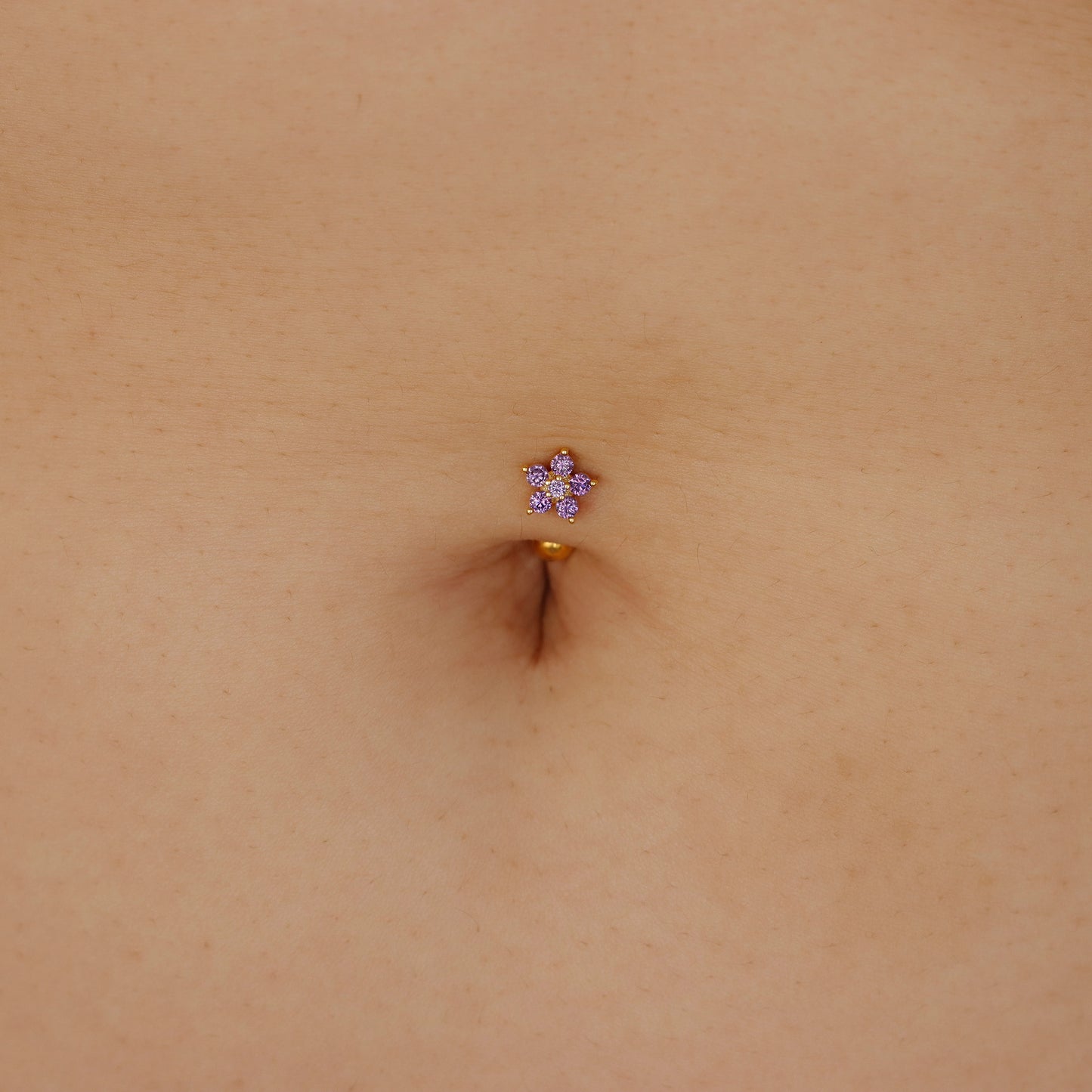 gold purple petite flower reverse navel ring