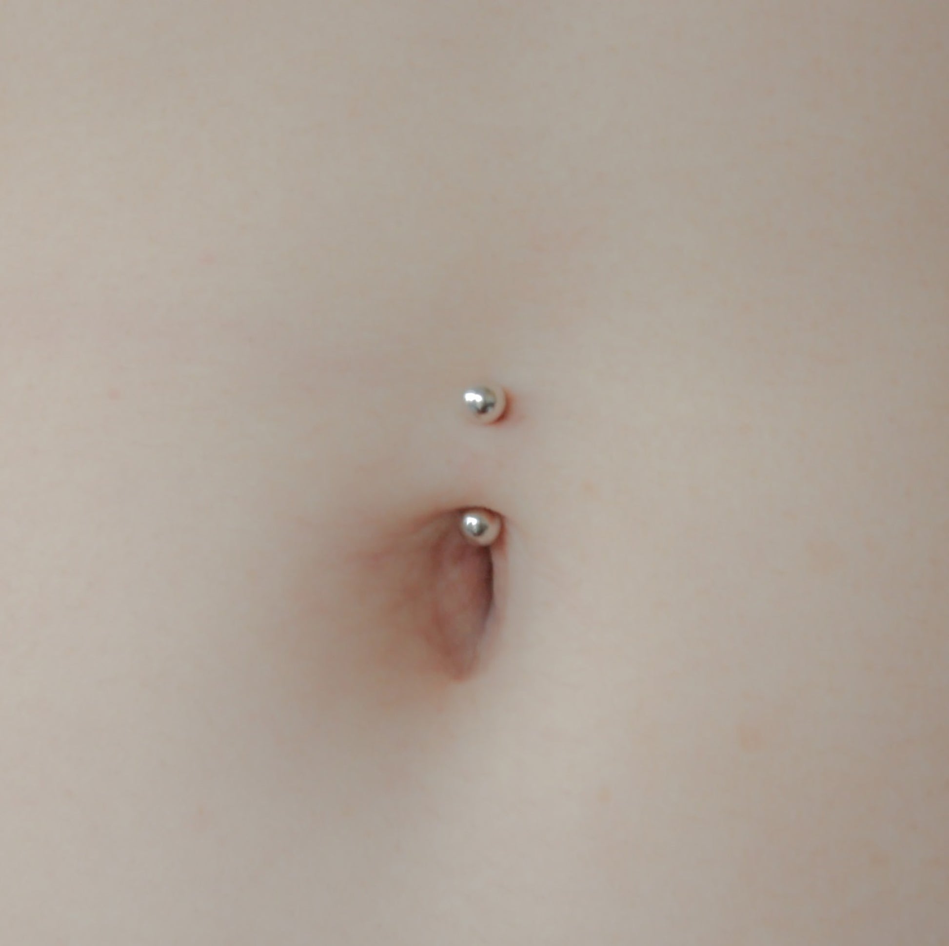 simple belly button piercing