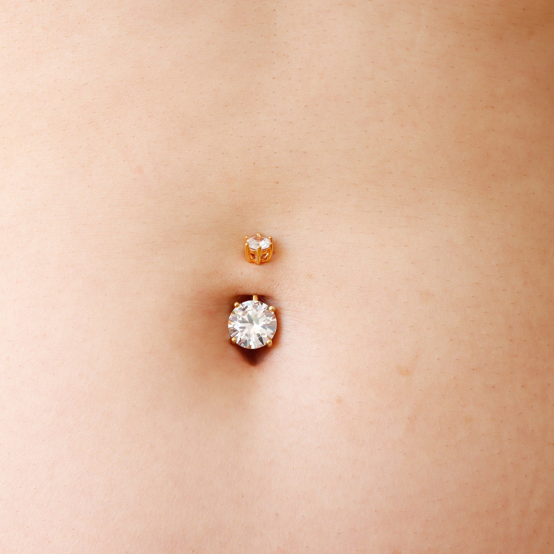 solitaire belly button piercing